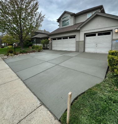 A finished concrete driveway at a residential home in Fredericksburg VA