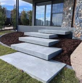 Concrete steps and staircase at a residential property